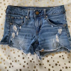 American Eagle distressed denim midi shorts size 4
